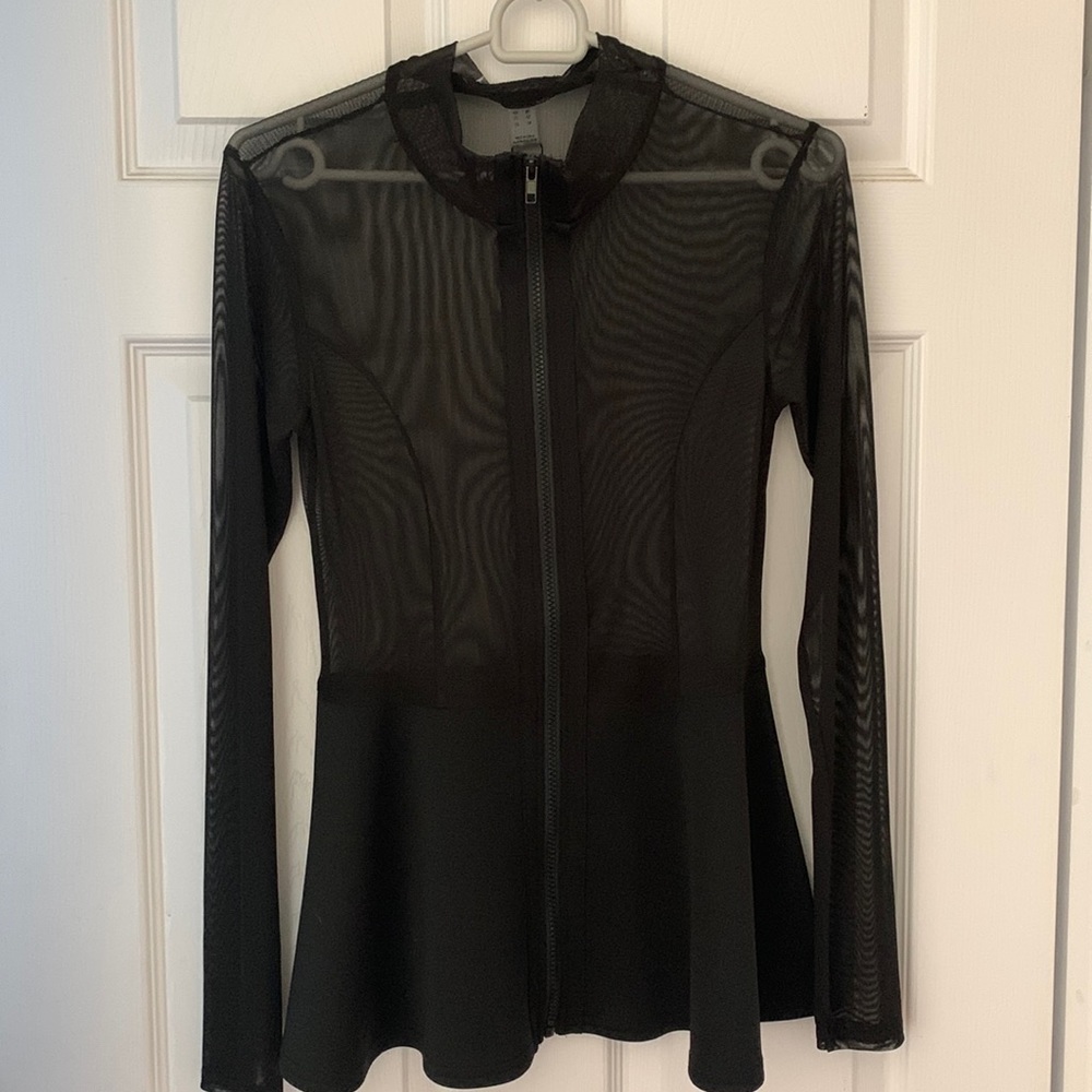 Revamped sheer peplum zip up